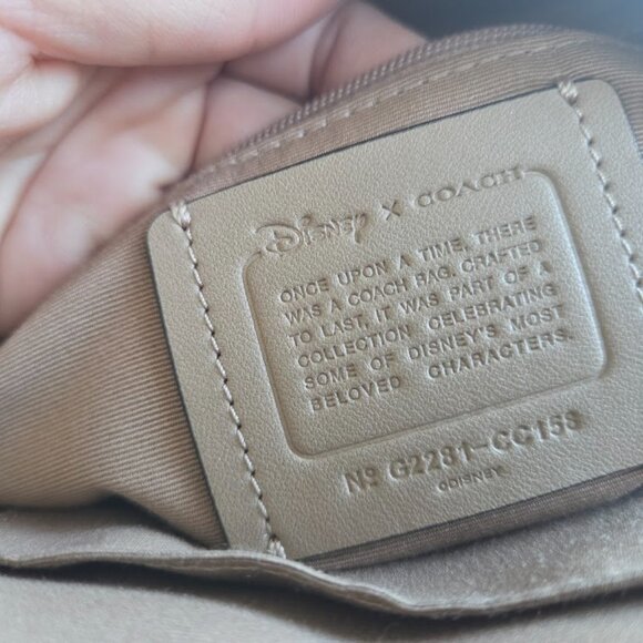 Coach X Disney (CC158) Cruella Motif Mini Pebbled Leather Court Backpack Bag - Picture 2 of 5